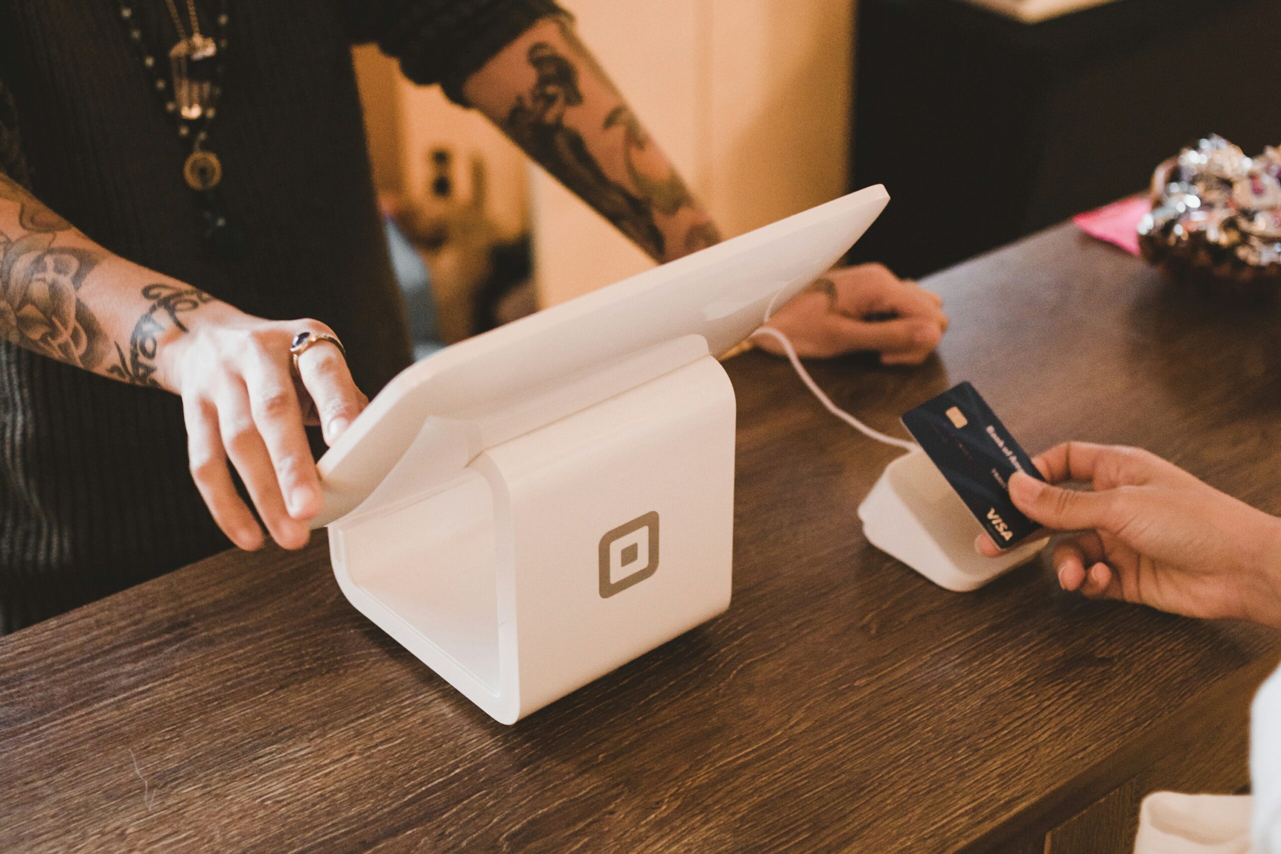 A person making a payment on a contactless payment system